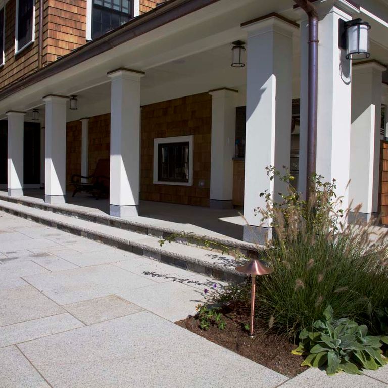 The image shows this product being used in a patio pavers application.