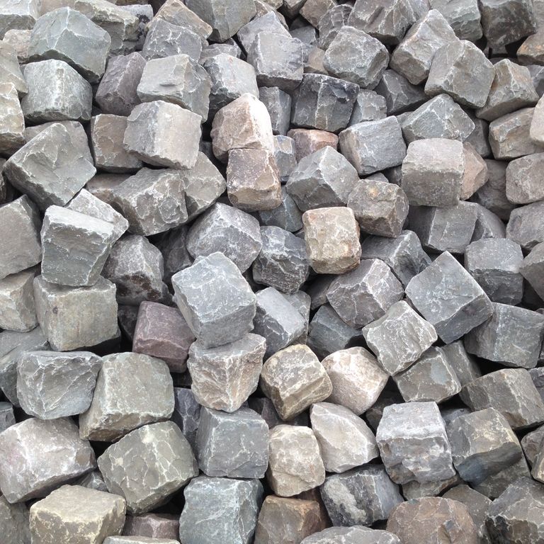 Application image for Reclaimed European Porphyry Cobblestones - Worn Cubes. The surface finish shown is . The dominant color shown is gray.