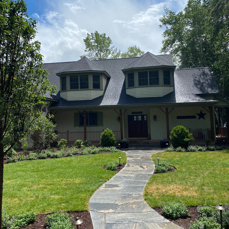The image shows this product being used in a path pavers application.