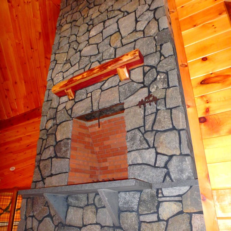 The image shows this product being used for Granite - Greenwich Blue - Veneer.