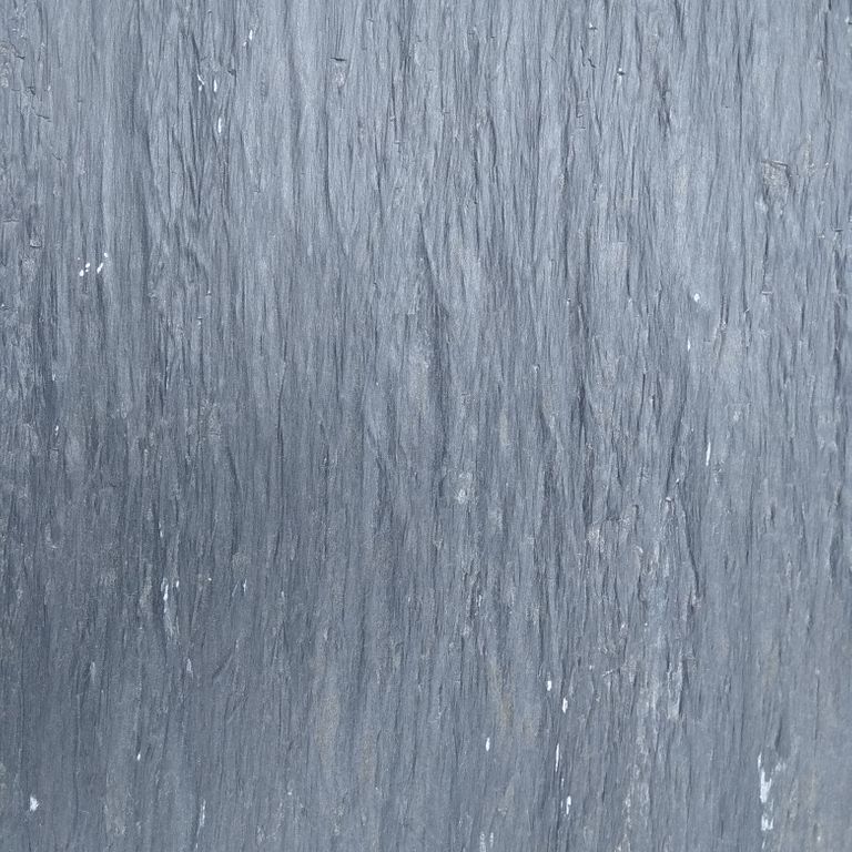 Swatch image cropped for Black Shale - Wall Veneer. The surface finish shown is natural. Dominant colors shown are blue and gray. Exhibits 