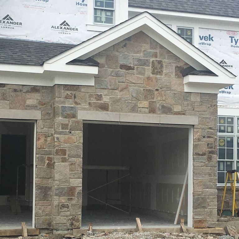 The image shows this product being used for Granite - Colonial Tan - Veneer.