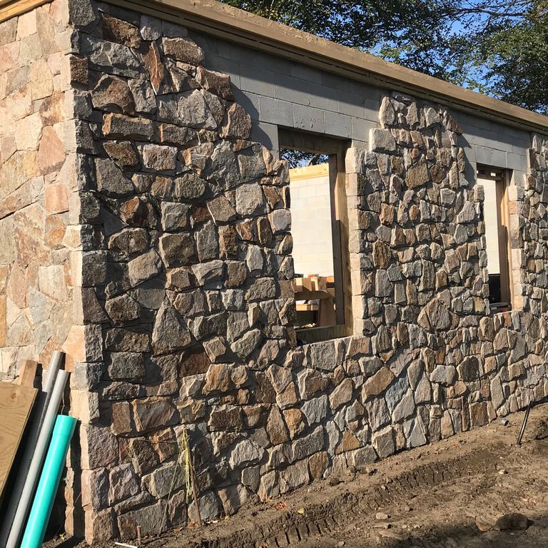 The image shows this product being used for Granite - Colonial Tan - Veneer.