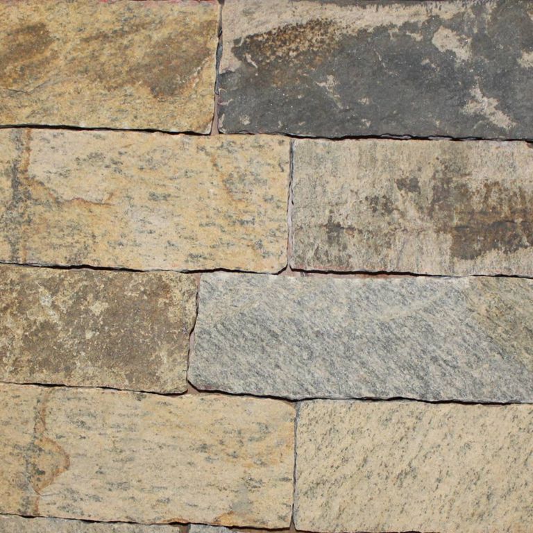 Close-up image for Nutmeg Ridge Granite - Veneer. The surface finish shown is natural. Dominant colors shown are brown and tan; with beige, gray and orange/rust secondaries. Exhibits 