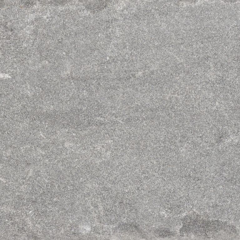 Swatch image cropped for Bluestone Blue/Gray - Cobblestone Pavers. The surface finishes shown are flamed and tumbled. The dominant color shown is gray; with beige and white secondaries. The color mix creates a cool feeling. Fine speckled and cloudy color patterns.