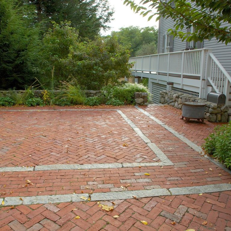The image shows this product being used in a patio pavers application.