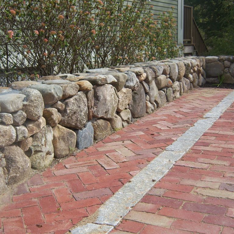 The image shows this product being used in a patio pavers application.