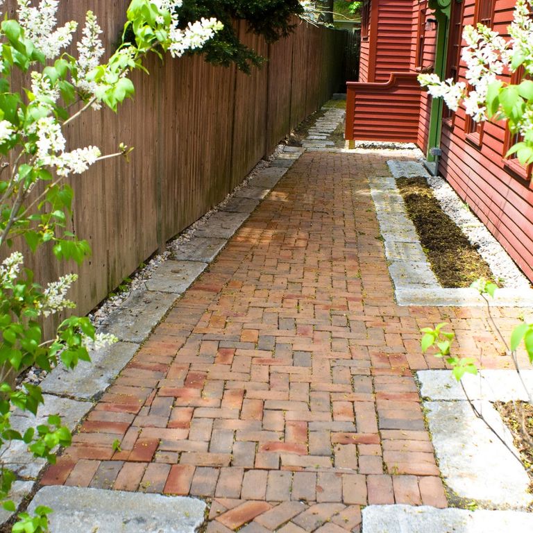 The image shows this product being used in a patio pavers application.
