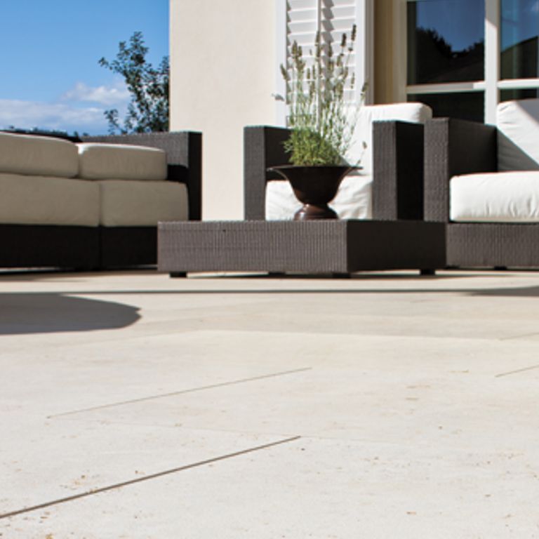 The image shows this product being used in a patio pavers application.