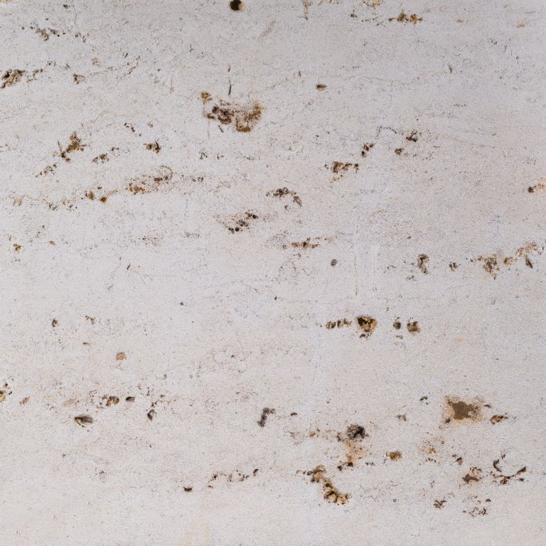 Color/Finish variation image for Bavarian Travertine - Beige - Wall Veneer. The surface finish shown is sand blasted. Dominant colors shown are beige, gray and white; with brown, pink and cream secondaries. The color mix creates a warm feeling. Blotched color pattern.