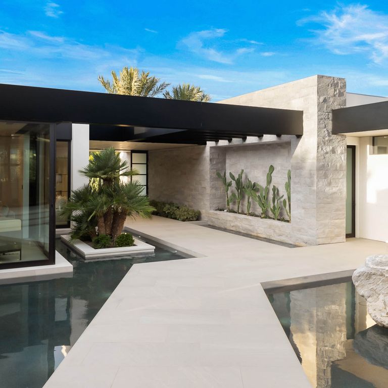 Application image for Bavarian Gray Limestone - Pool Coping. The image shows this product being used for pool coping and pool deck pavers. The dominant color shown is gray. The color mix creates a warm feeling.