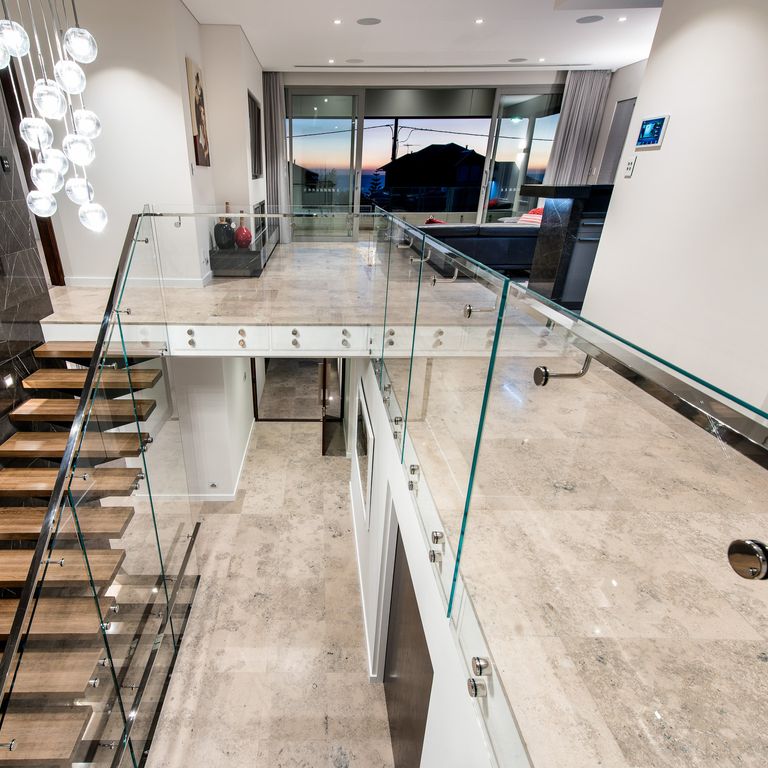 Application image for Bavarian Gray Limestone - Interior Floor. The image shows this product being used in an interior floor application. The dominant color shown is gray. The color mix creates a cool feeling.