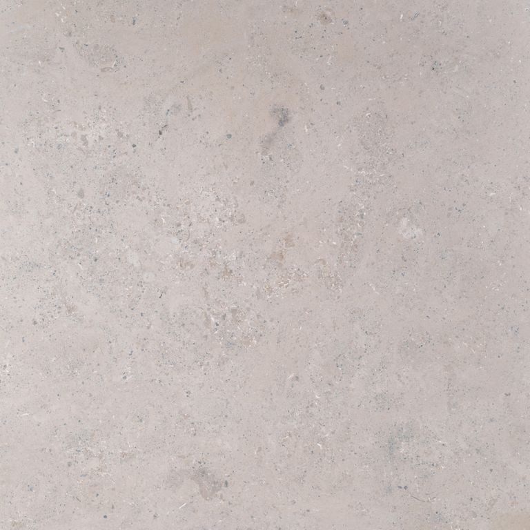 Swatch image cropped for Bavarian Limestone Gala - Beige - Cobblestones. The surface finish shown is honed. The dominant color shown is gray; with beige, pink, purple and white secondaries. Exhibits 