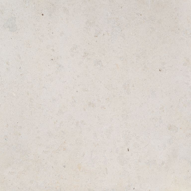 Swatch image cropped for Bavarian Limestone Gala - Beige - Interior Floor. The surface finish shown is sand blasted. Dominant colors shown are gray, white and cream; with beige and pink secondaries. Solid and cloudy color patterns. Contains mineral inclusions.