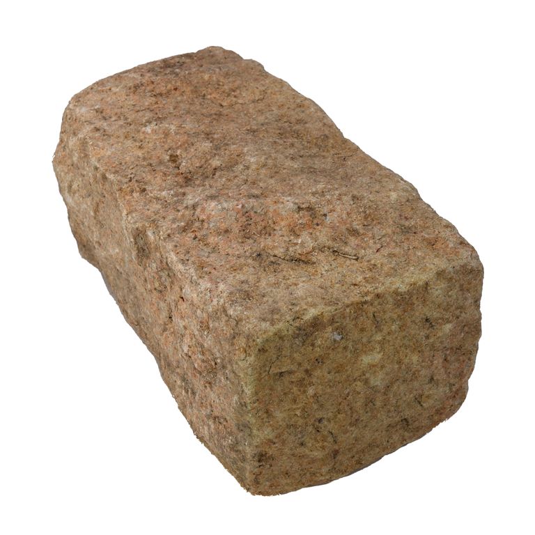 Oblique image for Yellow Granite Cobblestone - Rectangles. The surface finish shown is . Dominant colors shown are pink, yellow and tan. The color mix creates a warm feeling.