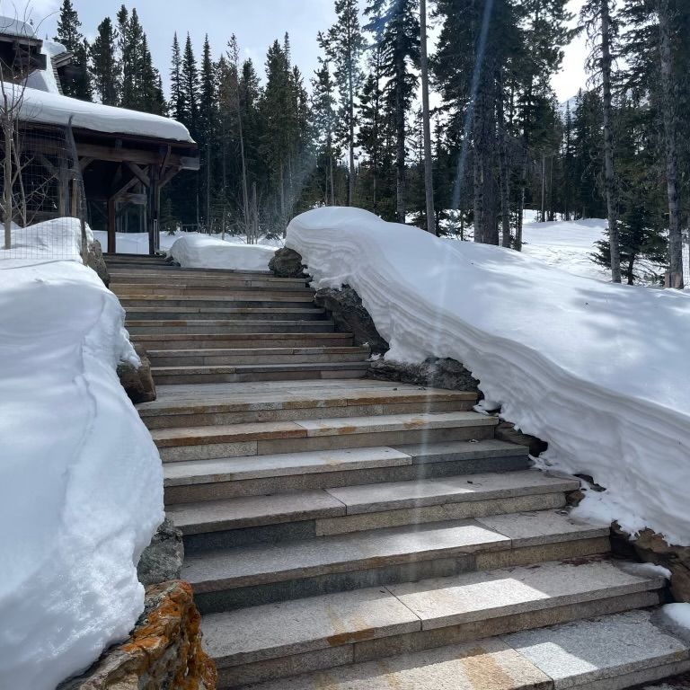 Application image for Granite- Reclaimed Footworn- Steps - Treads. The image shows this product being used in a treads application. Dominant colors shown are beige, brown, gray and tan.