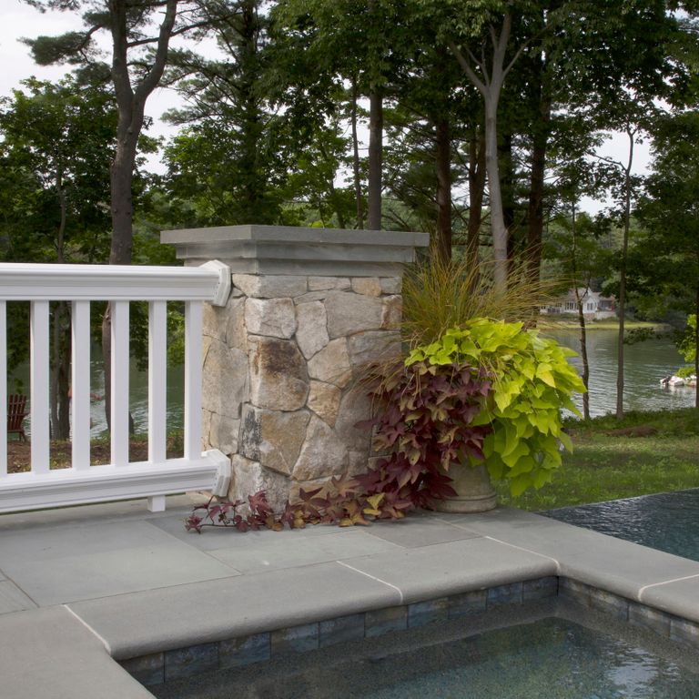 The image shows this product being used for Blue/Gray Bluestone - Flamed Pool Coping.