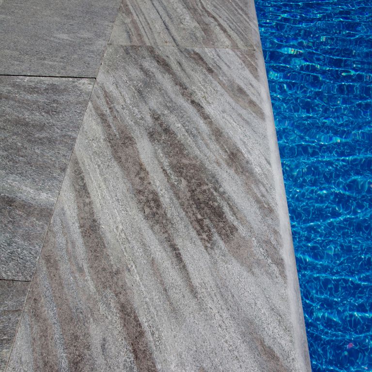 The image shows this product being used for pool coping, pool deck pavers and .