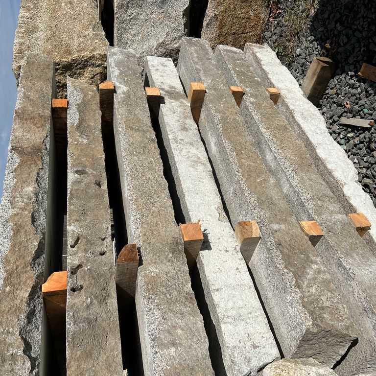 Application image for Granite - Reclaimed Landings - Sawn and Flamed Top, Live Edge. The surface finish shown is flamed. The dominant color shown is gray. The color mix creates a warm feeling.