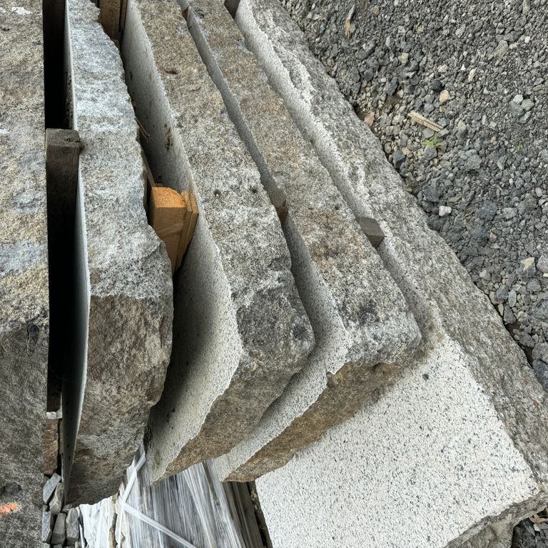 Application image for Granite - Reclaimed Landings - Sawn and Flamed Top, Live Edge. The surface finish shown is flamed. The dominant color shown is gray. The color mix creates a warm feeling.