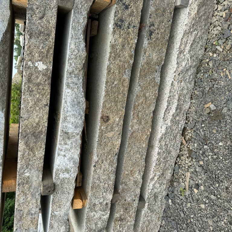 Application image for Granite - Reclaimed Landings - Sawn and Flamed Top, Live Edge. The surface finish shown is flamed. The dominant color shown is gray. The color mix creates a warm feeling.
