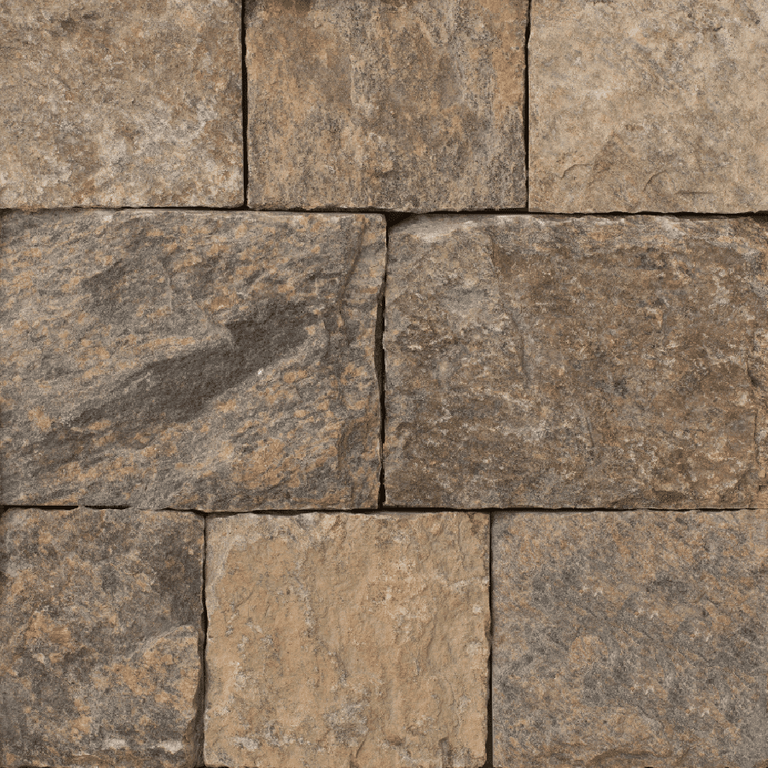 Feature image for Hudson Blend Granite - Veneer. The image shows this product being used for full bed veneer and thin veneer. The surface finish shown is a combination of natural, split-face and split-face with flat plane. Dominant colors shown are brown and tan; with beige, gray and orange/rust secondaries. The color mix creates a warm feeling. Regular and blotched color patterns.