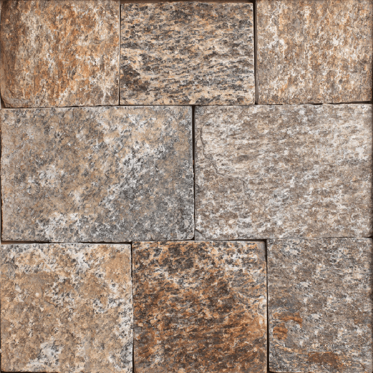 Feature image for Oak Ridge Granite - Veneer. The image shows this product being used for full bed veneer and thin veneer. Dominant colors shown are brown, gray and tan; with beige, orange/rust and purple secondaries. Exhibits 