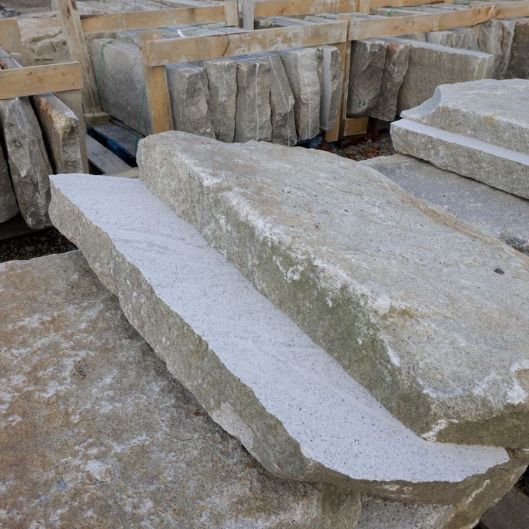 Application image for Granite - Reclaimed First Generation Curbstone - Gauged Floor Planks. The surface finish shown is . The dominant color shown is gray; with blue, brown, purple and white secondaries. The color mix creates a warm feeling. Speckled and blotched color patterns.