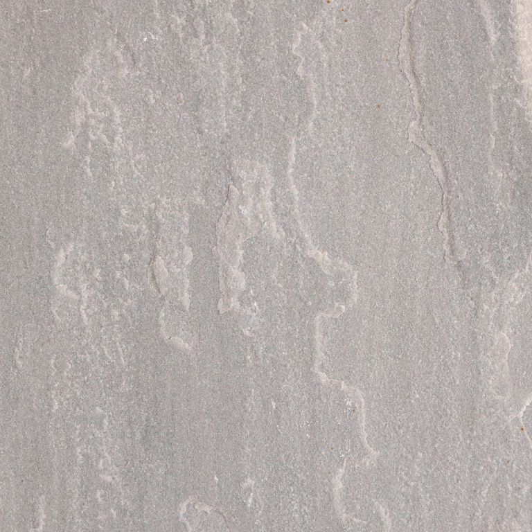 Color/Finish variation image for Lakeland Sandstone - Pavers. The dominant color shown is gray; with beige, blue, pink, purple and white secondaries. The color mix creates a warm feeling. Regular and linear color patterns.