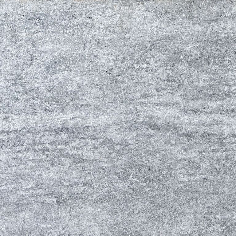 Swatch image for Mariana Soapstone™ Firebrick. The surface finish shown is honed. Dominant colors shown are blue and gray; with a white secondary. The color mix creates a cool feeling. Linear color pattern.