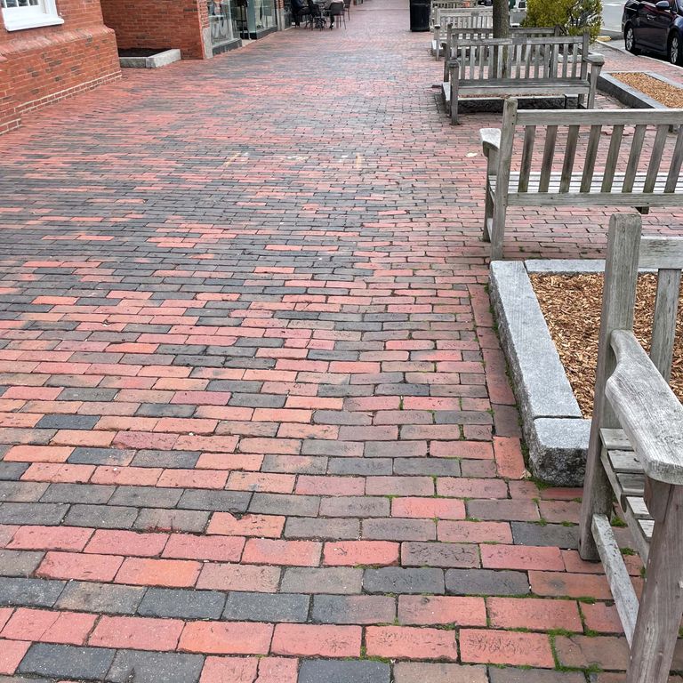 Feature image for Brick - Reclaimed Lexington Pavers. The image shows this product being used for path pavers, patio pavers and public area. The surface finish shown is . Dominant colors shown are orange/rust and red; with brown, orange/rust, purple and tan secondaries. The color mix creates a warm feeling. Regular color pattern.