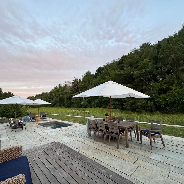 Application image for Pietra Italia Full Color Gneiss - Pavers. The image shows this product being used for patio pavers and pool deck pavers. The surface finish shown is natural cleft. Dominant colors shown are beige and gray. The color mix creates a warm feeling.