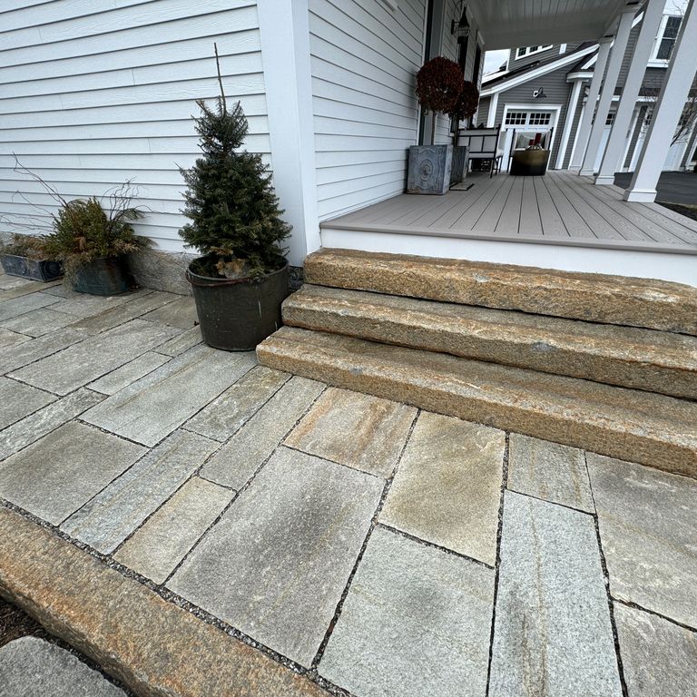 Application image for Pietra Italia Full Color Gneiss - Pavers. The image shows this product being used in a path pavers application. The surface finish shown is natural cleft. Dominant colors shown are beige and gray. The color mix creates a warm feeling.