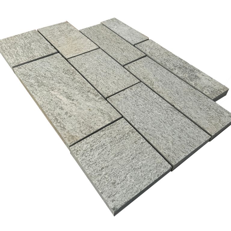 Oblique image for Pietra Italia Gneiss - Sawn Pavers. The surface finish shown is flamed. The dominant color shown is gray. The color mix creates a cool feeling.