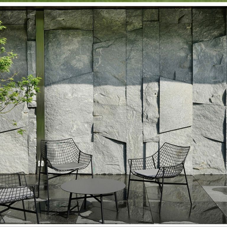 Application image for Granite - Zen Gray - Quarry Skin Thin Veneer. The image shows this product being used in a thin veneer application. The surface finish shown is natural cleft. The dominant color shown is gray. The color mix creates a cool feeling.
