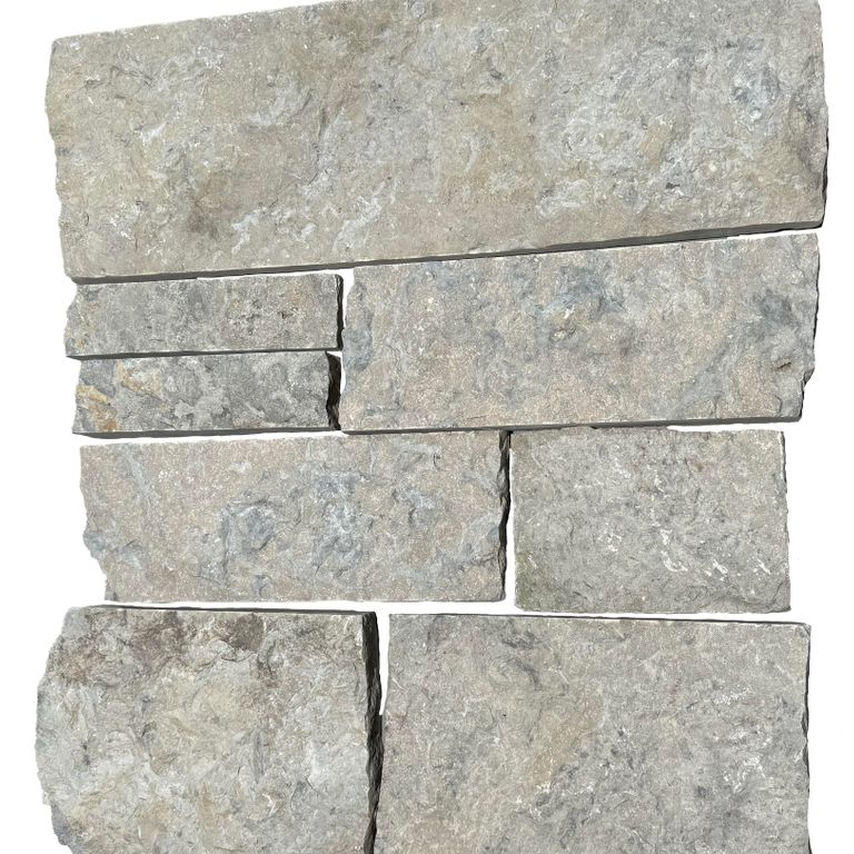 Feature image for Limestone - Rustic Gray Veneer - Splitface + Sawn. The surface finish shown is split-face. The dominant color shown is gray.