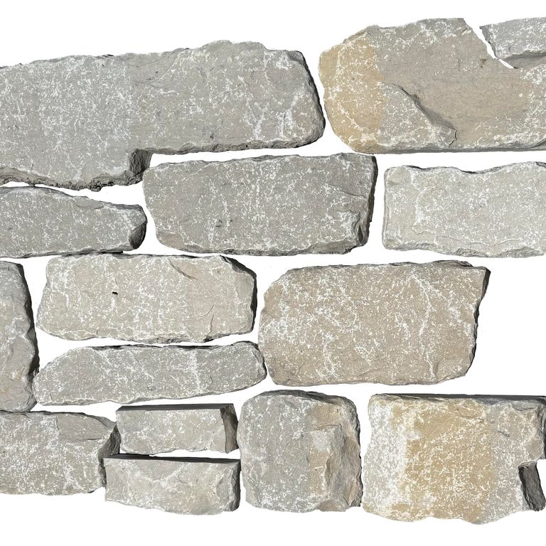 Oblique image for Lannon Gray Limestone Veneer - Splitface + Tumbled. The surface finish shown is . The dominant color shown is gray. The color mix creates a warm feeling.