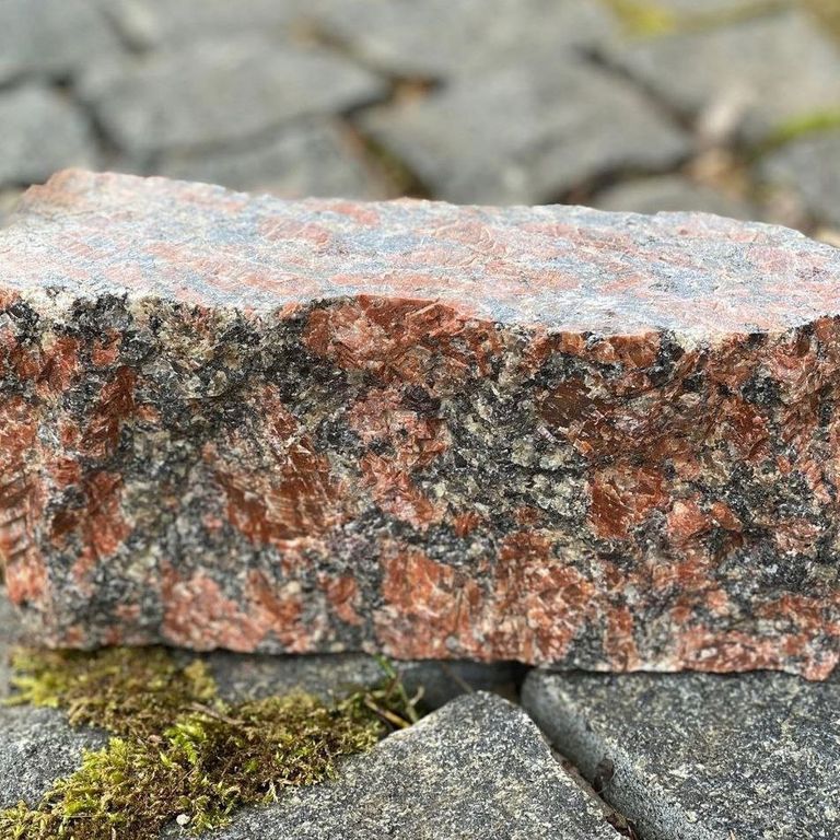 Application image for Red Crystal Granite - Cobblestones. Dominant colors shown are brown and orange/rust.
