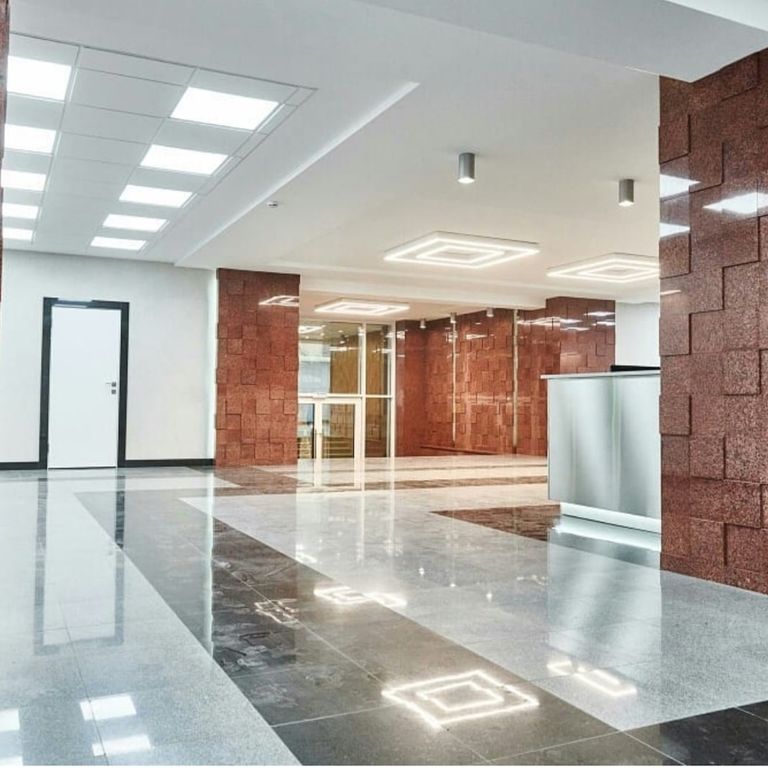 Application image for Granite - Red Pomegranate - Veneer. The image shows this product being used in a thin veneer application. The surface finish shown is polished. The dominant color shown is red. The color mix creates a warm feeling.