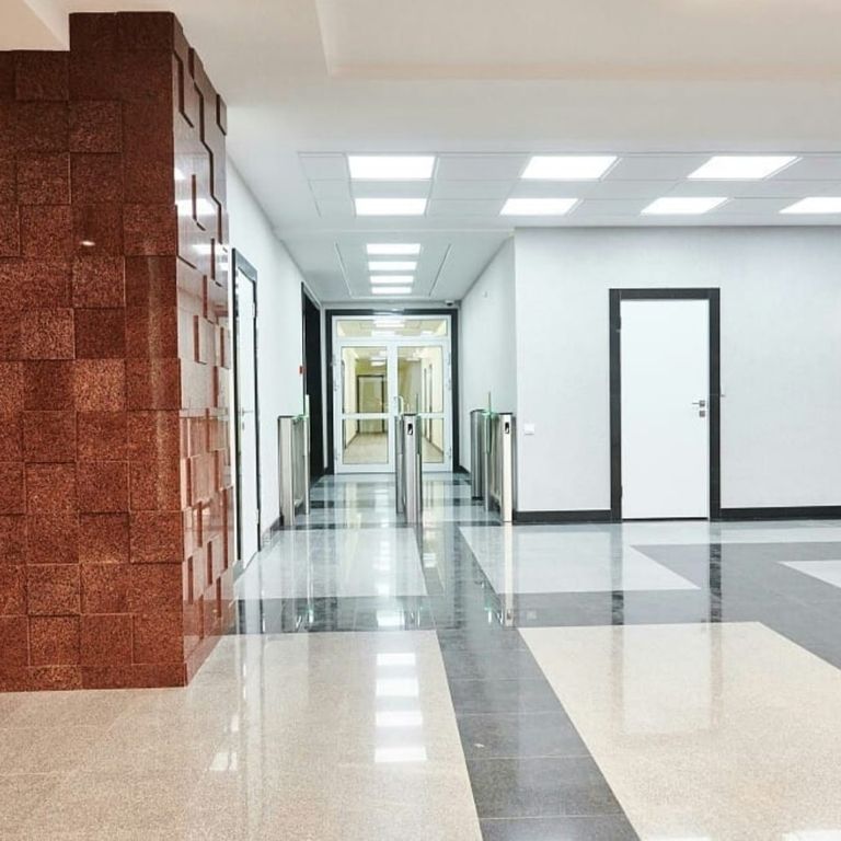 Application image for Granite - Red Pomegranate - Veneer. The image shows this product being used in a thin veneer application. The surface finish shown is polished. The dominant color shown is red. The color mix creates a warm feeling.