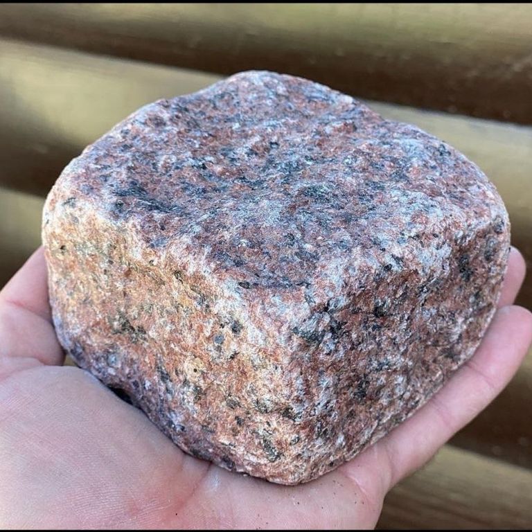 Application image for Red Pomegranate Granite - Cobblestones. The surface finish shown is tumbled. Dominant colors shown are orange/rust and red. The color mix creates a warm feeling.