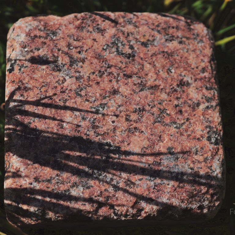 Application image for Red Pomegranate Granite - Cobblestones. The surface finish shown is flamed. The dominant color shown is red. The color mix creates a warm feeling.