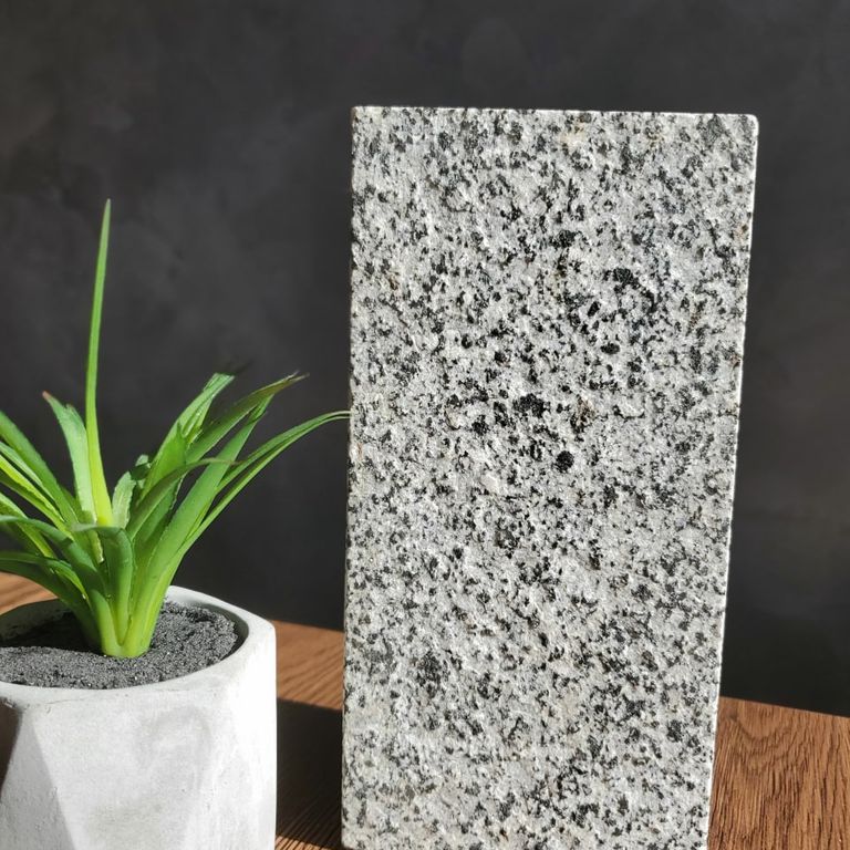 Application image for Granite - White House - Veneer. Dominant colors shown are black, gray and white. The color mix creates a cool feeling.
