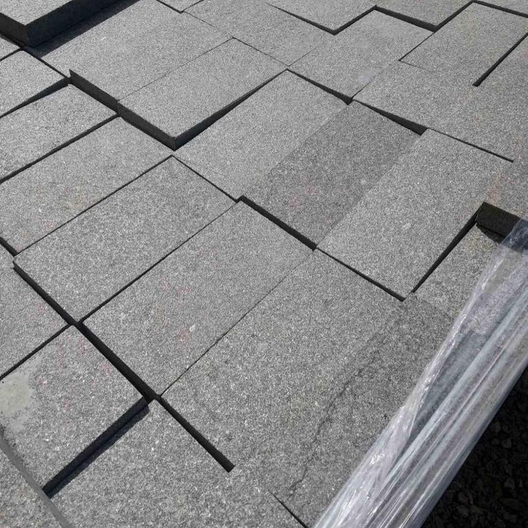Application image for Gabbro Dark Magma Granite - Pavers. The dominant color shown is gray. The color mix creates a cool feeling.