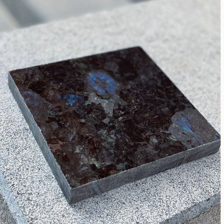 Application image for Labradorite - Blue Seven Oceans - Interior Tiles. The surface finish shown is polished. The dominant color shown is black. The color mix creates a cool feeling.