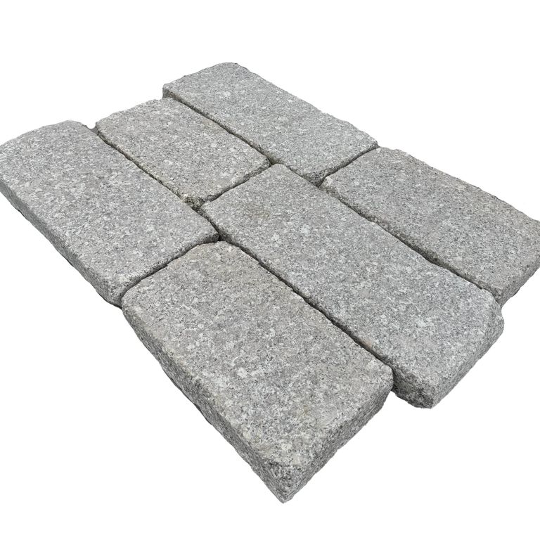Feature image for Deer Isle Granite - Antiqued Plank Pavers. Dominant colors shown are gray and pink. The color mix creates a cool feeling.