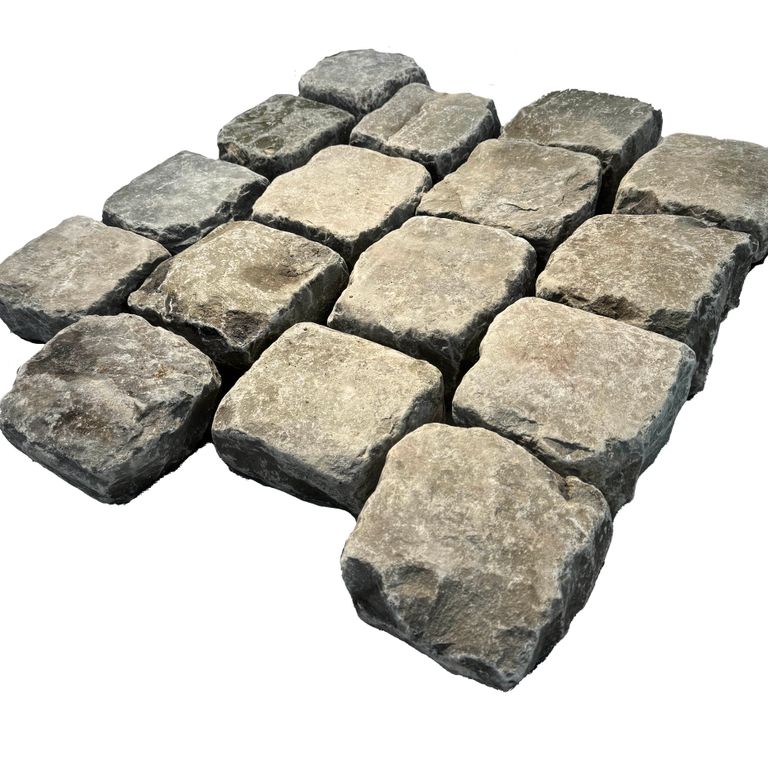 Oblique image for Reclaimed European Porphyry Cobblestones - Square - Antiqued. The surface finish shown is . Dominant colors shown are beige, gray and tan. The color mix creates a warm feeling.