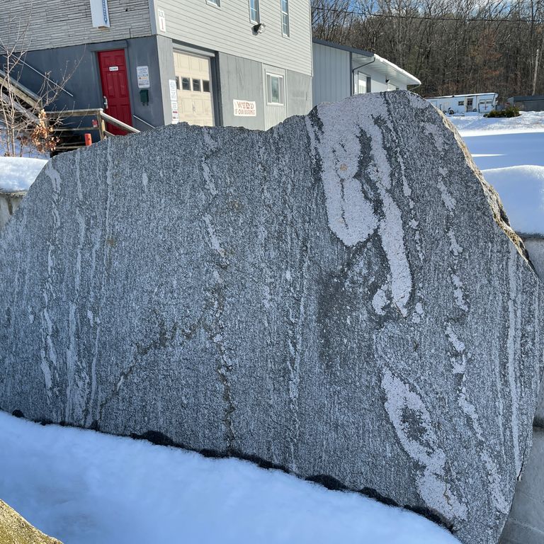Application image for Fieldstone - New England Boulders - Sawn. The dominant color shown is gray.