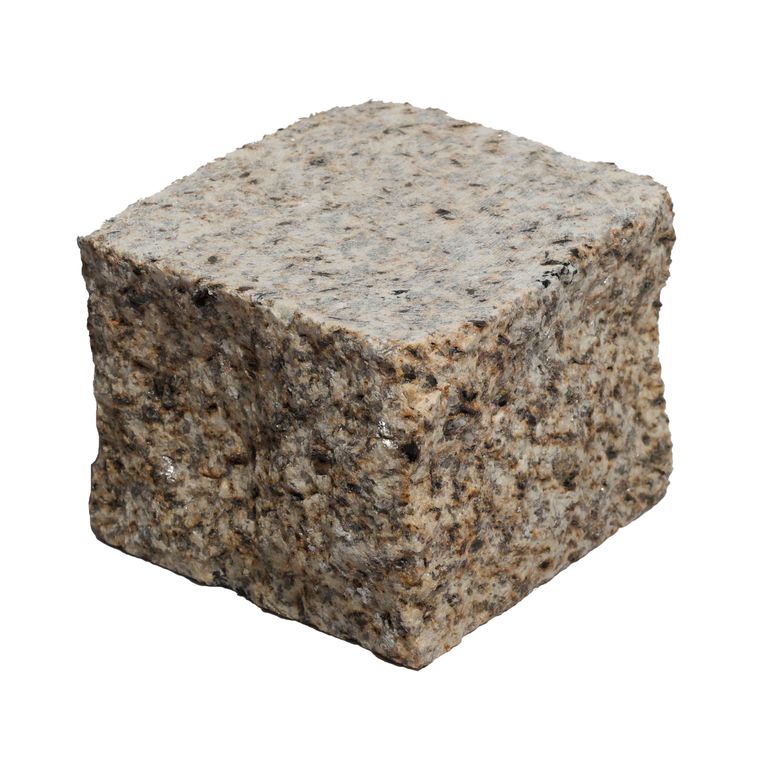 Oblique image for Yellow Oat Granite - Cobblestones. The surface finish shown is sawn. Dominant colors shown are yellow and cream. The color mix creates a warm feeling.