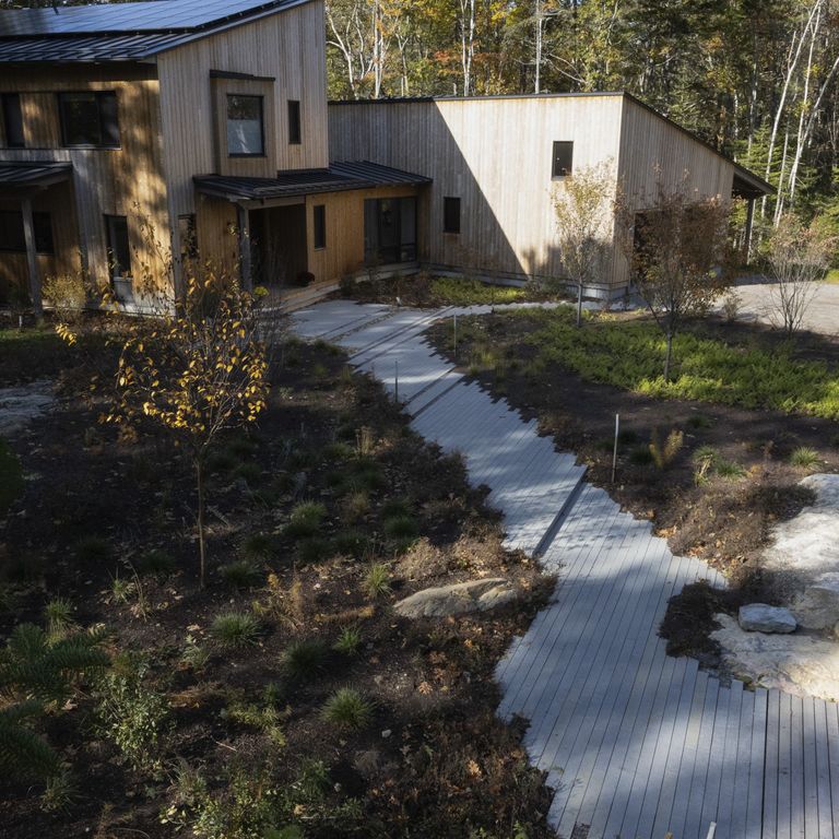 Application image for Limestone - Polar Gray - Dimensional Cut Pavers. The image shows this product being used in a path pavers application. Dominant colors shown are blue and gray. The color mix creates a cool feeling.